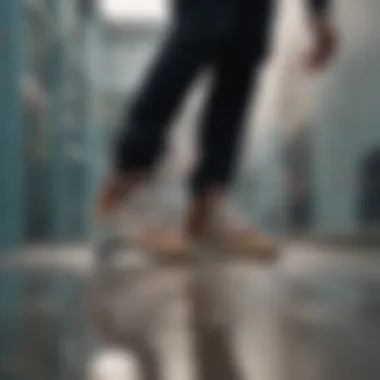 Style Meets Performance on the Board A close-up of a skateboarder’s shoes from adidas, capturing motion and style.