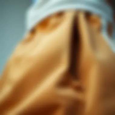 Fabric Texture of Adidas Tan Sweatpants Close-up of the fabric texture of Adidas tan sweatpants