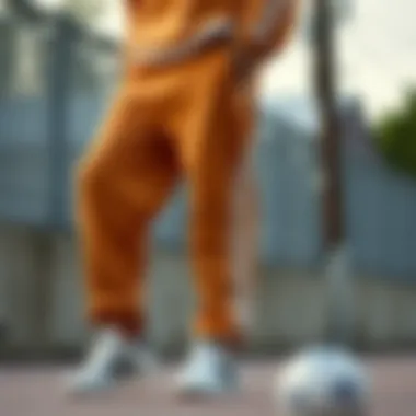 Stylish Streetwear with Adidas Tan Sweatpants Adidas tan sweatpants paired with trendy streetwear