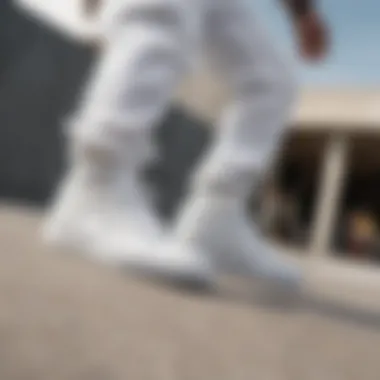 All White DC Shoes in Action A dynamic shot of a skateboarder wearing all white DC shoes in action.