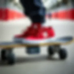 A pair of striking red DC Shoes showcased on a skateboard