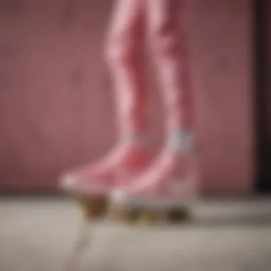 Dynamic Moves in Pink Suede Nike Footwear Skater performing tricks in pink suede Nike shoes