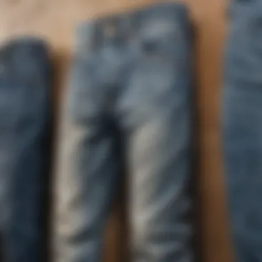 Collection of acid wash denim jeans on display