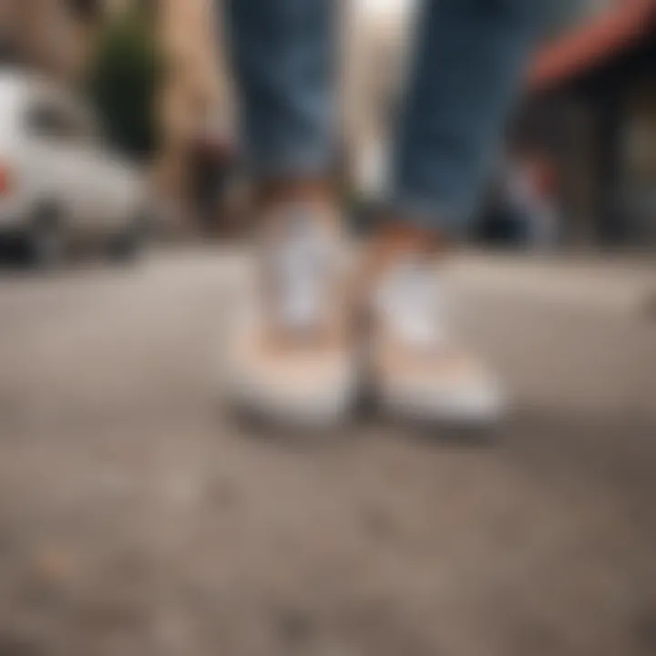 Stylish individual showcasing tan and white checkered Vans in urban setting