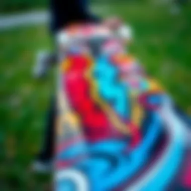 A close-up of a skateboard deck featuring stunning graphic designs