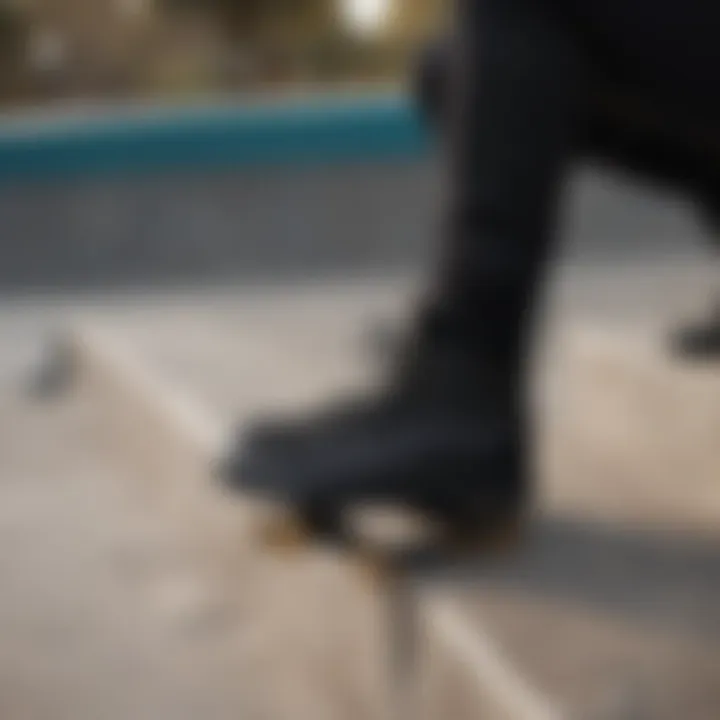 Stylish all-black Vans boots displayed on a skate park ledge