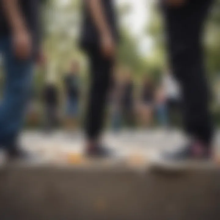 Group of skateboarders in a park, all wearing black floral Converse sneakers