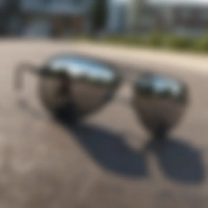 Variety of black mirrored aviators displayed on a skateboard deck