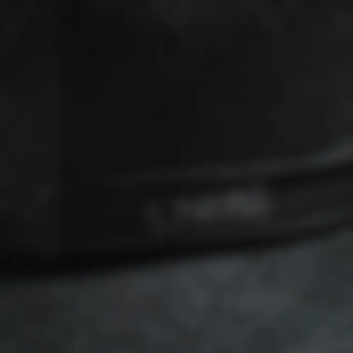 Close-up of the fabric texture of a black strap back hat