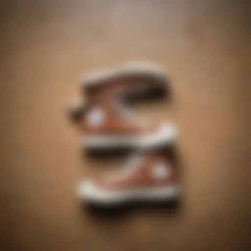 Brown Chuck Taylors against a skateboard background