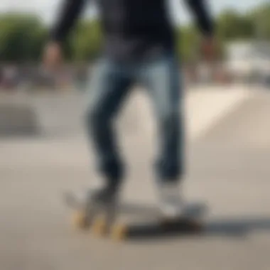 A skateboarder wearing Enjoi jeans performing a trick at a skate park