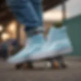 Light blue high top Vans on a skateboard