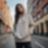 Nike Essential Oversized Hoodie showcased in urban setting