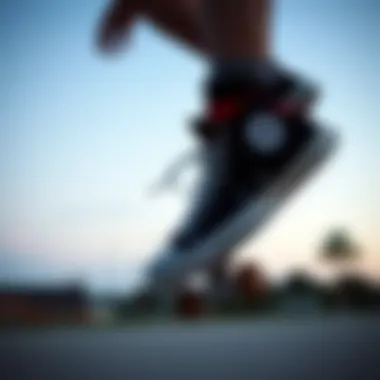 Skateboarder Utilizing Black Hi-Top Converse Skateboarder wearing Black Hi-Top Converse