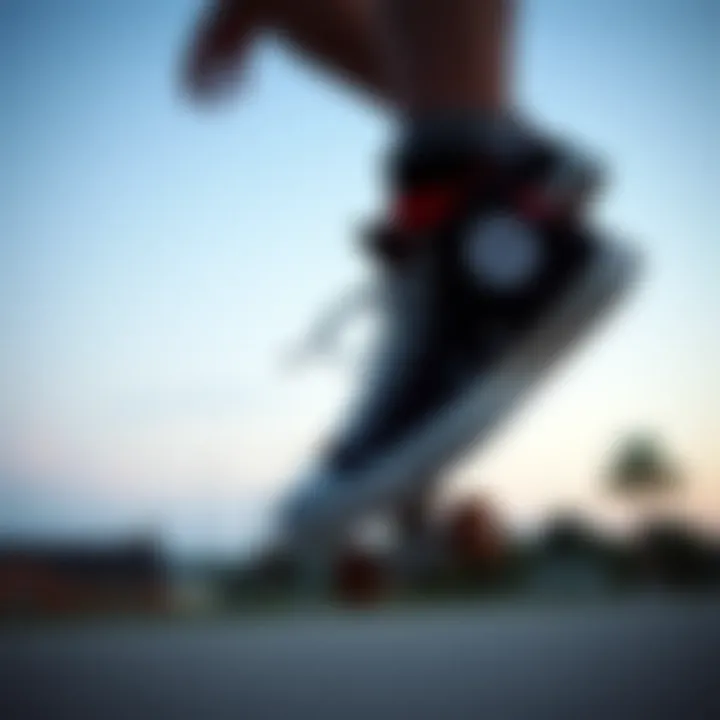Skateboarder Utilizing Black Hi-Top Converse Skateboarder wearing Black Hi-Top Converse