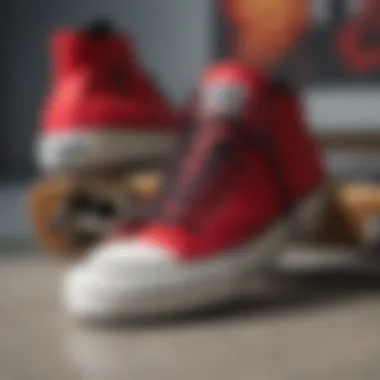 Close-up of red and black Chuck Taylor sneakers on a skateboard