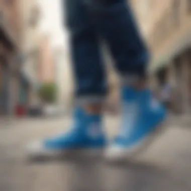 Skater wearing custom blue Converse in an urban setting