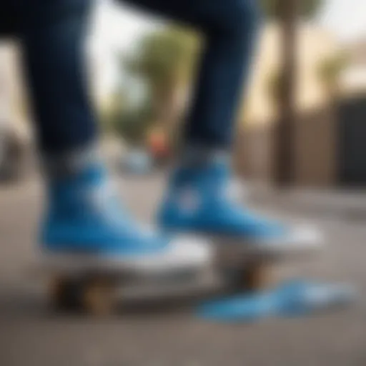 Custom blue Converse shoes on a skateboard