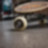 A close-up of a skateboard showcasing its unique deck design and grip tape.