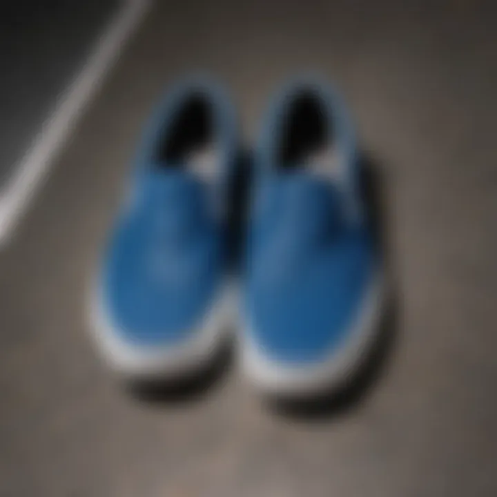 Blue slip-on Vans in contemporary fashion context