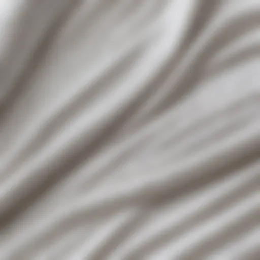 A close-up of the fabric texture of a white wind breaker jacket.