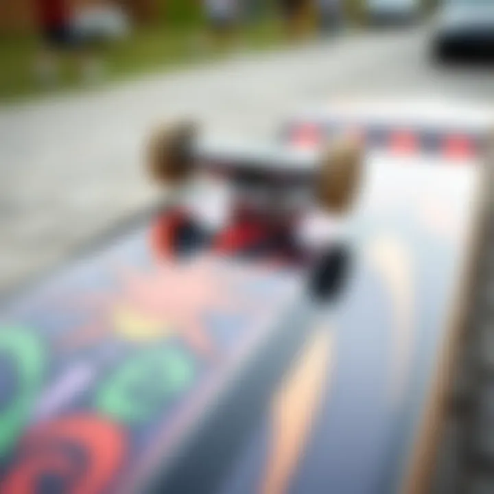 A close-up view of the graphic art on the Toy Machine skateboard deck