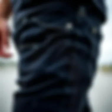 Detail of Faded Black Skinny Jeans Close-up of faded black skinny jeans showcasing wear and style