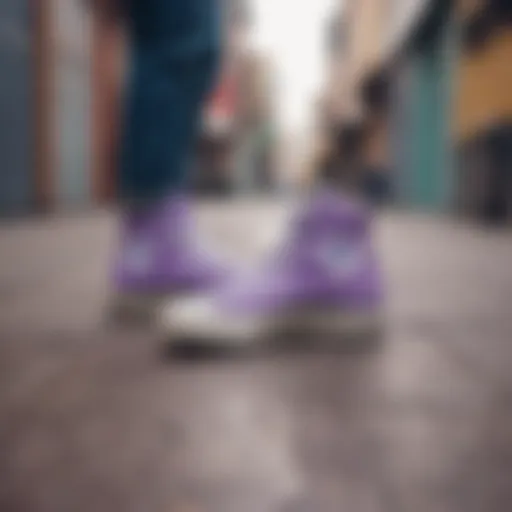 Aesthetic display of lavender Converse shoes against a vibrant urban backdrop