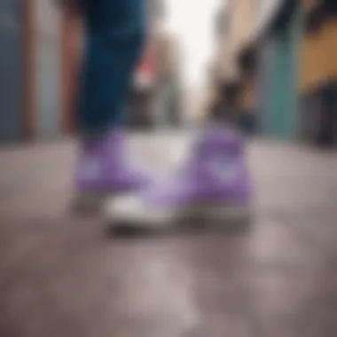 Lavender Converse in Urban Style Aesthetic display of lavender Converse shoes against a vibrant urban backdrop