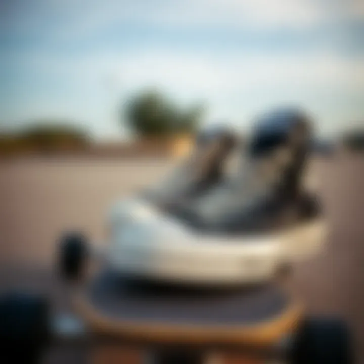 Close-up of low top black Chucks on a skateboard