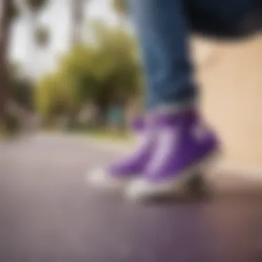 A skateboarder performing tricks while wearing purple Chuck Taylor high tops