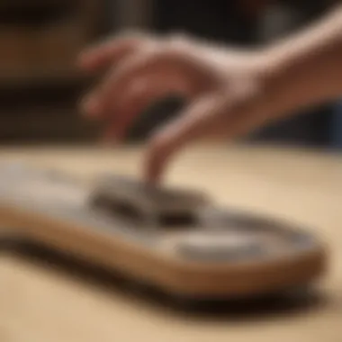 A detailed view of fingerboarding tricks being performed on a TechDeck.