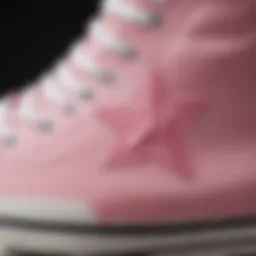 Close-up of the Converse Chuck Taylor All Star in pink showcasing the iconic star logo