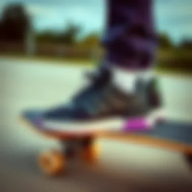 Adidas Sneakers in Action Stylish black and purple Adidas sneakers on a skateboard