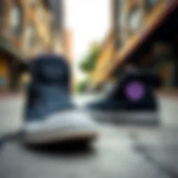 Dynamic view of black and purple Converse high tops in urban skate setting
