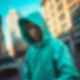 A vibrant mint hoodie showcased in an urban environment