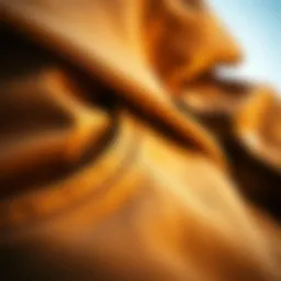 A close-up of the texture and fabric of brown baggy jeans, highlighting their comfort and style.