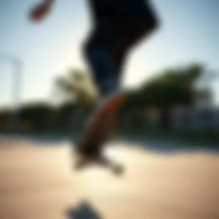 Skateboarder performing a trick in black Dickies during a sunny day
