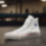 A close-up of White Converse showcasing its iconic design details