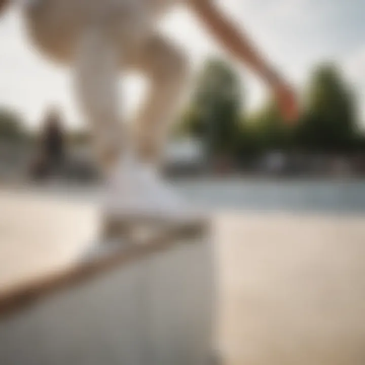 A skater performing tricks in White Converse on a skate park