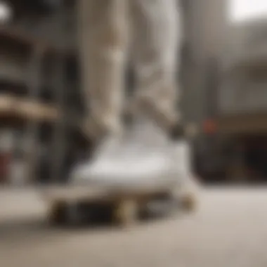 Performance in Action: Vans UltraRange on Skateboard Vans UltraRange White sneakers in action on a skateboard